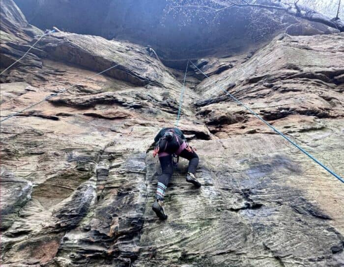 women rock climbing at Red River Gorge in Kentucky