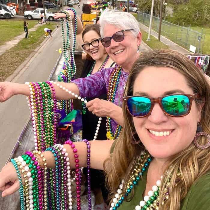 women on float for Mardi Gras