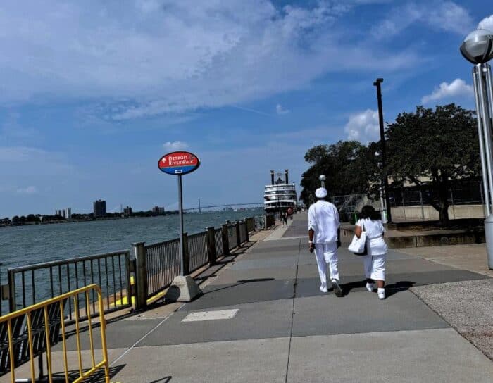 couple walking along Detroit Riverwalk