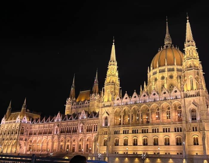 view of Parliament during scenic boat tour on Danube River in Budapest Hungary