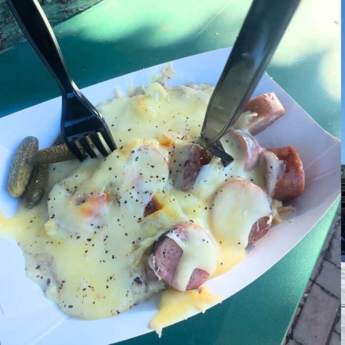 Raclette cheese over boiled potatoes and tartiflette