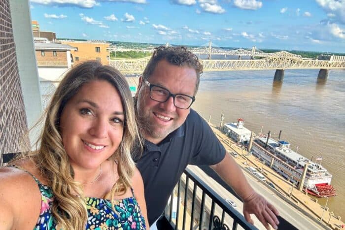 couple on balcony Galt House Hotel in Louisville