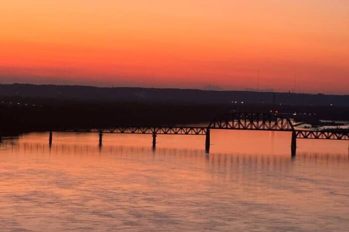 sunset from balcony Deluxe Waterview Suite at The Galt House Hotel