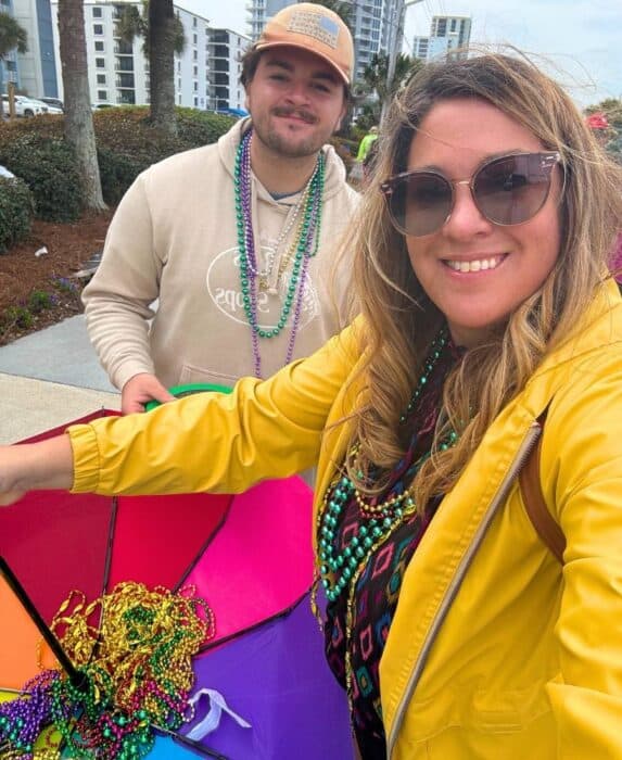 family at Mardi Gras Parade in Gulf Shores