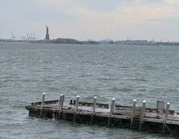 view of Statue of Liberty from inside Staten Island ferry