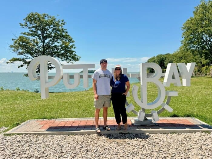 mother and son by the Put in Bay sign 1